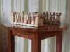 Replika-šachovnice+stolek. Intarzie-ořech,javor,švestka. Figurky: materiál lípa, mořeno ořech, lakováno, výška cca 12cm. Vše ruční práce.